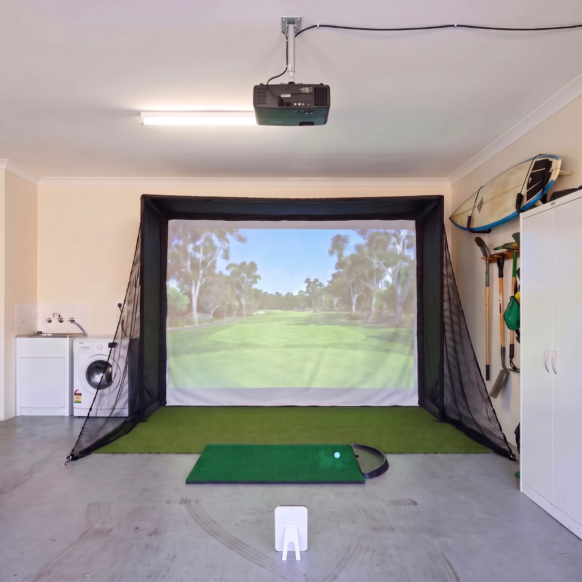 Kaizen Golf TOUR Champion 4K Golf Simulator Package in a home garage